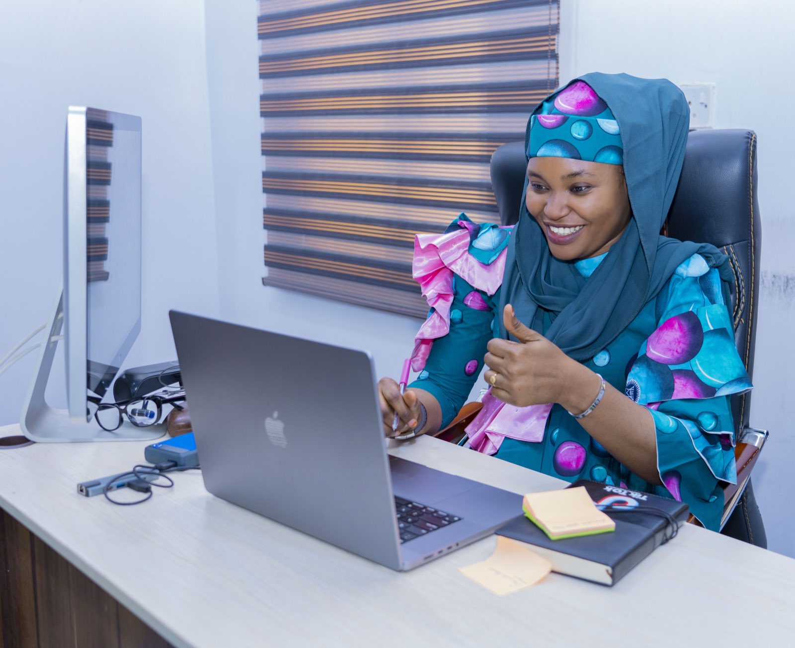 A tutor working with a learner during a live Hausa lesson